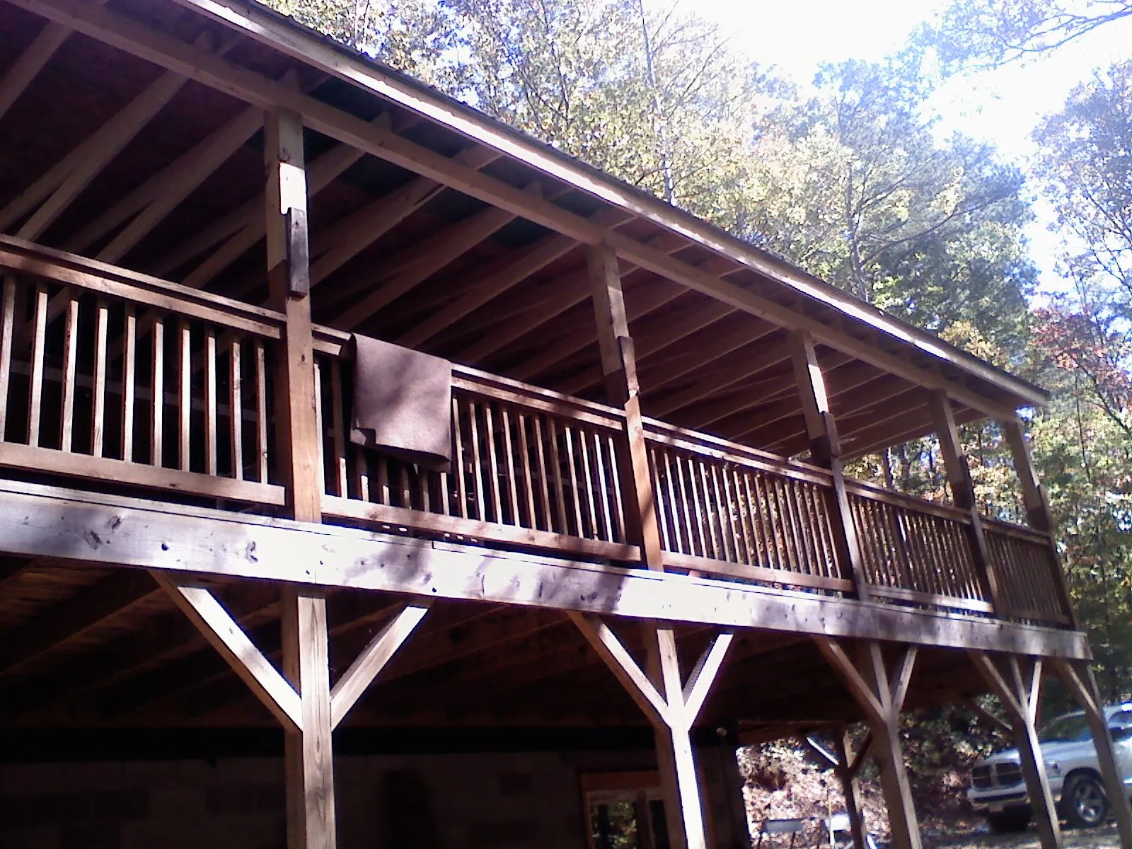 Timber framing under a new elevated porch and deck — Roof Leak Repair in Cohasset by Roofing Brothers